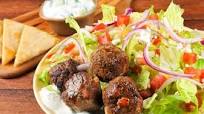 Turkey Gyro Meatball Salad with homemade tzatziki dressing and toasted pita chips Turkey Gyro Meatball Salad with homemade tzatziki dressing and toasted pita chips