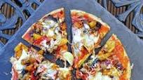 Gluten Free Crispy Pizza topped with Roasted Vegetables Gluten Free Crispy Pizza topped with Roasted Vegetables