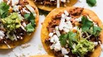 Tostadas (with chorizo and beans) Tostadas (with chorizo and beans)