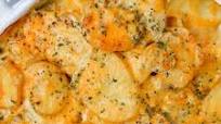 Cheesy Scalloped Potatoes Cheesy Scalloped Potatoes