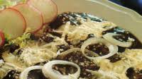 Enmoladas o Enchiladas de mole. Receta de cocina mexicana Enmoladas o Enchiladas de mole. Receta de cocina mexicana
