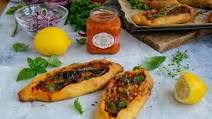 Pide (Turkish pizza) with chopped beef and ajvar Pide (Turkish pizza) with chopped beef and ajvar