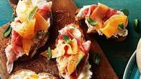 Rockmelon bruschetta with goat's cheese and prosciutto Rockmelon bruschetta with goat's cheese and prosciutto