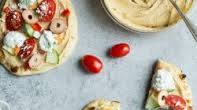 Veggie-Loaded Flatbread Pizza with Hummus and Tzatziki Veggie-Loaded Flatbread Pizza with Hummus and Tzatziki