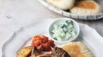 Kofta Kebabs served with Pitta Discs,Paprika Chips,Raita and Spicy Tomato Chutney Kofta Kebabs served with Pitta Discs,Paprika Chips,Raita and Spicy Tomato Chutney