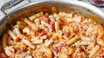 Spicy Shrimp Pasta in Garlic Tomato Cream Sauce Spicy Shrimp Pasta in Garlic Tomato Cream Sauce