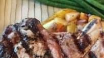Cider-Cured Pork Chops on a bed of Caramelized Apples and Onions Cider-Cured Pork Chops on a bed of Caramelized Apples and Onions