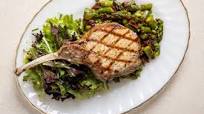 Grilled Tomahawk Pork Chops with Asparagus & Sun-Dried Tomatoes Grilled Tomahawk Pork Chops with Asparagus & Sun-Dried Tomatoes