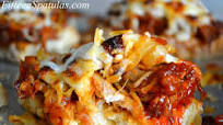 Pulled Pork Bruschetta with Caramelized Onions and Mozzarella Recipe - (4.5/5) Pulled Pork Bruschetta with Caramelized Onions and Mozzarella Recipe - (4.5/5)