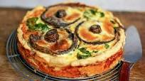 Spinach, mushroom and ricotta quiche with sautéed spinach Spinach, mushroom and ricotta quiche with sautéed spinach
