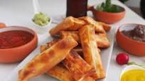 Mixto Tequeños - Two Cheese and Ham Tequeños with Guacamole Mixto Tequeños - Two Cheese and Ham Tequeños with Guacamole