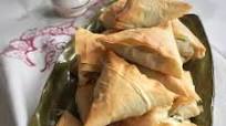 Spanakopita triangles with store bought phyllo or spanakopitakia Spanakopita triangles with store bought phyllo or spanakopitakia