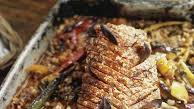 Slow-roasted spiced pork loin with black-eyed beans and tomatoes Slow-roasted spiced pork loin with black-eyed beans and tomatoes