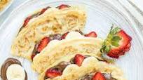 Nutella Crepes with Bananas and Strawberry Nutella Crepes with Bananas and Strawberry