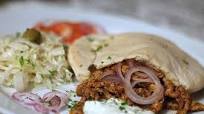 Roros Gyros in Flatbread with Tzatzki, Onions and Coleslaw Roros Gyros in Flatbread with Tzatzki, Onions and Coleslaw