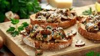 Bruschetta de cogumelos com queijo emmental Bruschetta de cogumelos com queijo emmental
