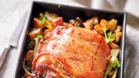 Porchetta-style pork belly with garlic roasties Porchetta-style pork belly with garlic roasties