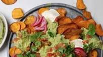 Ultimate guacamole with sweet potato nachos, crispy chickpeas and crème fraîche Ultimate guacamole with sweet potato nachos, crispy chickpeas and crème fraîche