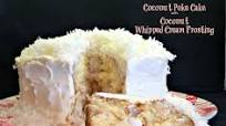 Coconut Cream Poke Cake with Coconut Whipped Cream Frosting Coconut Cream Poke Cake with Coconut Whipped Cream Frosting