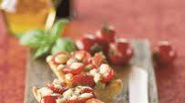 Bruschetta van cherrytomaten, pesto en Mozzarella. Bruschetta van cherrytomaten, pesto en Mozzarella.