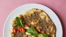 Man'oushe with Za'atar Oil, Tomatoes, and Cucumber Man'oushe with Za'atar Oil, Tomatoes, and Cucumber