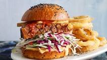Pork belly, tofu and Sriracha slaw burgers with Sichuan onion rings Pork belly, tofu and Sriracha slaw burgers with Sichuan onion rings
