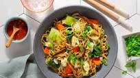 Chinese long-life noodles with stir-fried bok choy and mushrooms Chinese long-life noodles with stir-fried bok choy and mushrooms