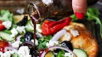 Lighten up Your Favorite Junk Food With This Greek Salad Pizza Recipe Lighten up Your Favorite Junk Food With This Greek Salad Pizza Recipe