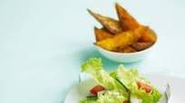 Tikka pork chops with Bombay-spiced sweet potato wedges Tikka pork chops with Bombay-spiced sweet potato wedges