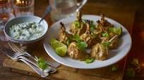 Tandoori chicken lollipop drumsticks with raita dip Tandoori chicken lollipop drumsticks with raita dip