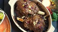 Kashmiri-style roast lamb shanks with cranberries, pistachios and almonds Kashmiri-style roast lamb shanks with cranberries, pistachios and almonds