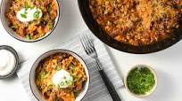 One-Pan Weeknight Beef Enchilada Skillet with sour cream, cheddar-jack, and green onions One-Pan Weeknight Beef Enchilada Skillet with sour cream, cheddar-jack, and green onions