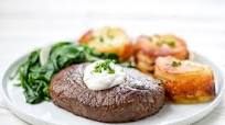 Steak with Horseradish-Herb Cream and potatoes pressé and wilted spinach Steak with Horseradish-Herb Cream and potatoes pressé and wilted spinach