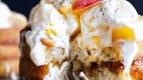 Churro Waffles w/ Peaches & Cream Sauce Churro Waffles w/ Peaches & Cream Sauce