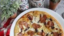 Pizza With Lemon, Mortadella, and Black Olives Pizza With Lemon, Mortadella, and Black Olives