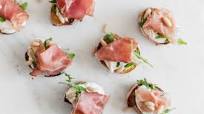 Crostini with rocket, buffalo stracciatella, Parma Ham and pine nuts Crostini with rocket, buffalo stracciatella, Parma Ham and pine nuts
