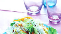Tostada with salad, cheese and chilli dressing Tostada with salad, cheese and chilli dressing