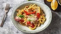 Tuscan Chicken Linguine with Roasted Tomato, Basil, and a Creamy Parmesan Sauce Tuscan Chicken Linguine with Roasted Tomato, Basil, and a Creamy Parmesan Sauce