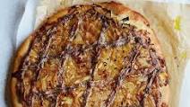Pizza with onions and anchovies Pizza with onions and anchovies