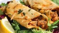 chicken tikka roll serve it with cucumber yoghart. chicken tikka roll serve it with cucumber yoghart.