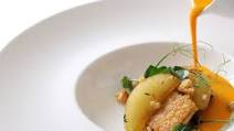 Pumpkin velouté with chicken wings, apples and almonds Pumpkin velouté with chicken wings, apples and almonds