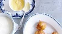 Greek pastry puffs with lemon curd Greek pastry puffs with lemon curd