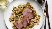 Olive Brine–Marinated Pork with Roasted Olives and Beans Olive Brine–Marinated Pork with Roasted Olives and Beans