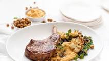 Sumac Marinated Pork Cutlets with Roasted Cauliflower & Kale Salad & Hummus Sumac Marinated Pork Cutlets with Roasted Cauliflower & Kale Salad & Hummus