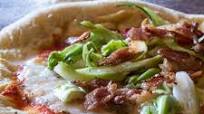 Pizza con farina di semola e lievito di birra Pizza con farina di semola e lievito di birra
