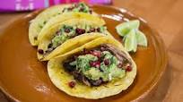 Pomegranate Pork Tacos with Guacamole and Queso Fresco Pomegranate Pork Tacos with Guacamole and Queso Fresco