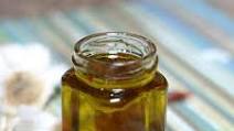 Garlicky Sun-Dried Tomato-Infused Oil Garlicky Sun-Dried Tomato-Infused Oil