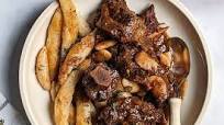 Jamaican Braised Oxtail With Buttered Spinners Jamaican Braised Oxtail With Buttered Spinners