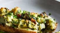Twice-Baked Potatoes With Creamy Chive Pesto Twice-Baked Potatoes With Creamy Chive Pesto