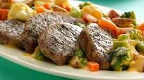 Roasted Pork Chops with Cheesy Vegetables Roasted Pork Chops with Cheesy Vegetables